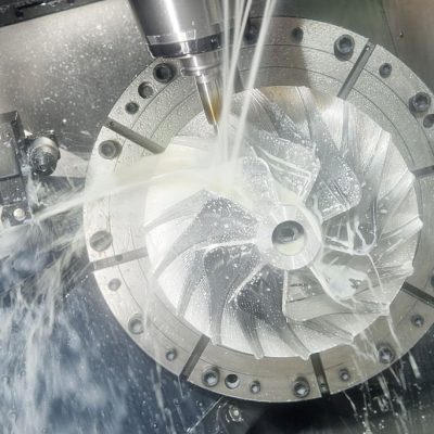 Milling metalworking process. Industrial CNC machining of metal detail by cutting end-tooth vertical mill at factory